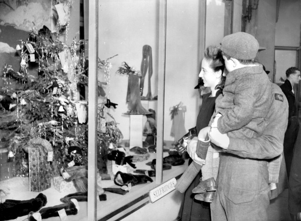 A soldier Christmas shopping in Oxford Street, London. - 16-December-1941